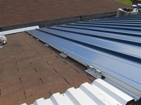 metal roof install on house|metal roofing over existing shingles.